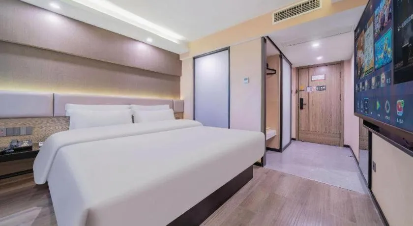 Bed in IU Hotel Chongqing Airport T3 Terminal