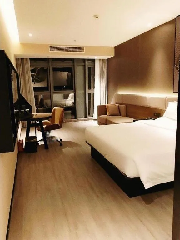 Bed in IU Hotel Chongqing Airport T3 Terminal