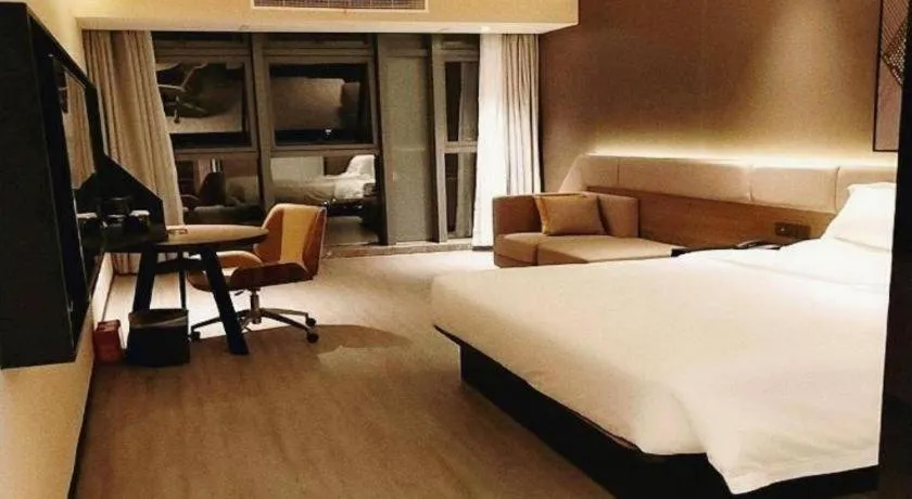 Bed in IU Hotel Chongqing Airport T3 Terminal