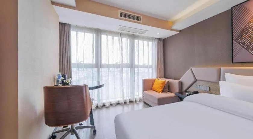 Bed in IU Hotel Chongqing Airport T3 Terminal