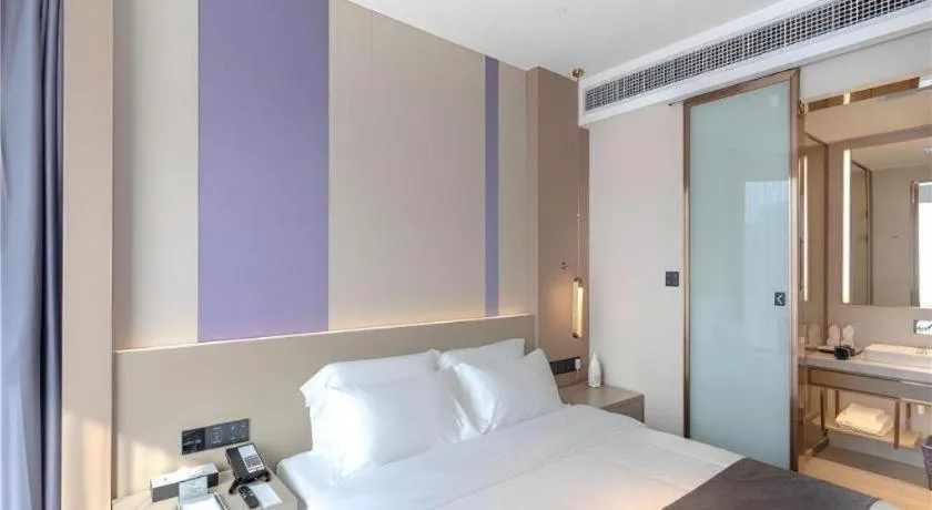 Bed in Lavande Hotel Huazhou Beijing Road