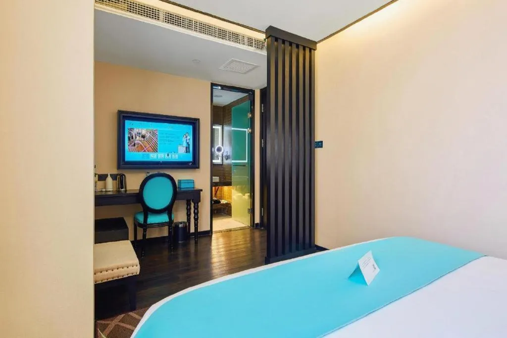 Bed in Xana Lite Hotelle Tianjin Huaming Binhai International Airport