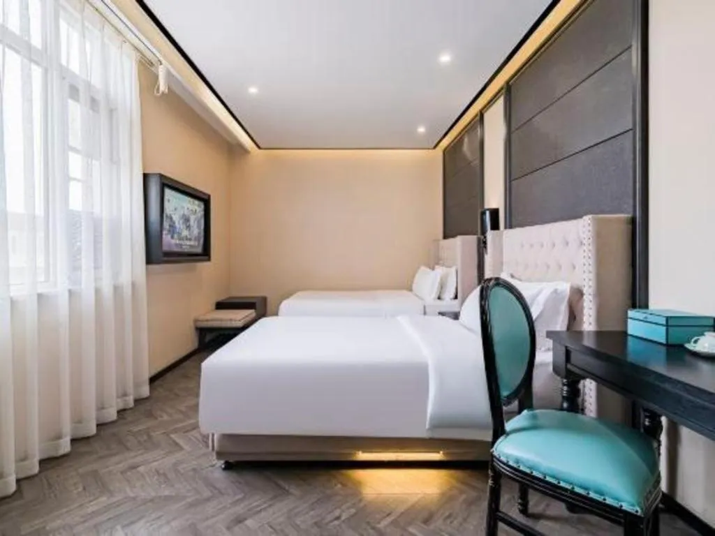 Bed in Xana Lite Hotelle Tianjin Huaming Binhai International Airport