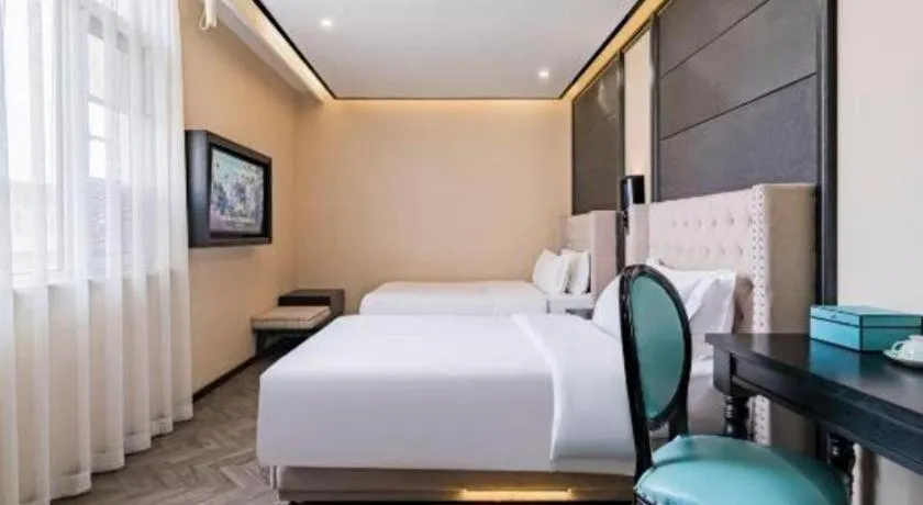 Bed in Xana Lite Hotelle Tianjin Huaming Binhai International Airport