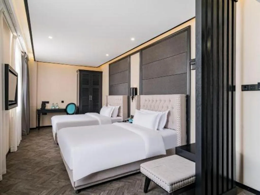 Bed in Xana Lite Hotelle Tianjin Huaming Binhai International Airport