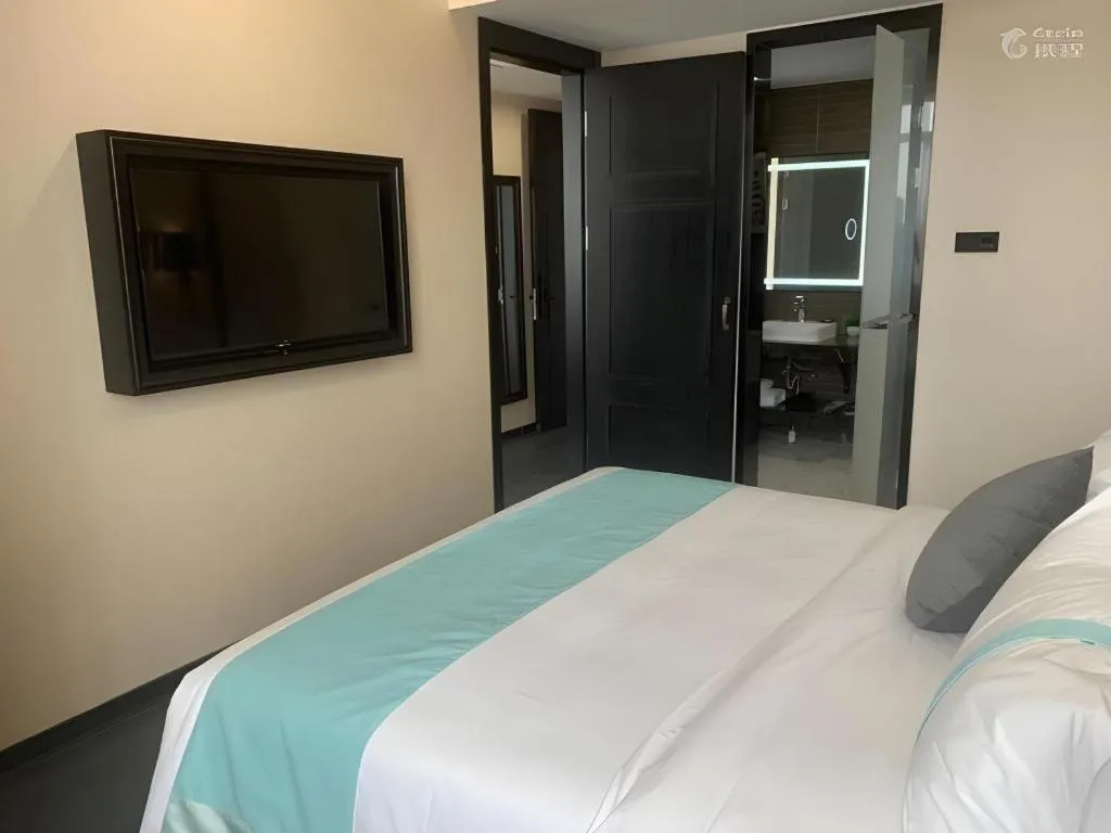 Bed in Xana Lite Hotelle Tianjin Huaming Binhai International Airport