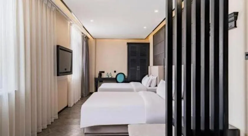 Bed in Xana Lite Hotelle Tianjin Huaming Binhai International Airport