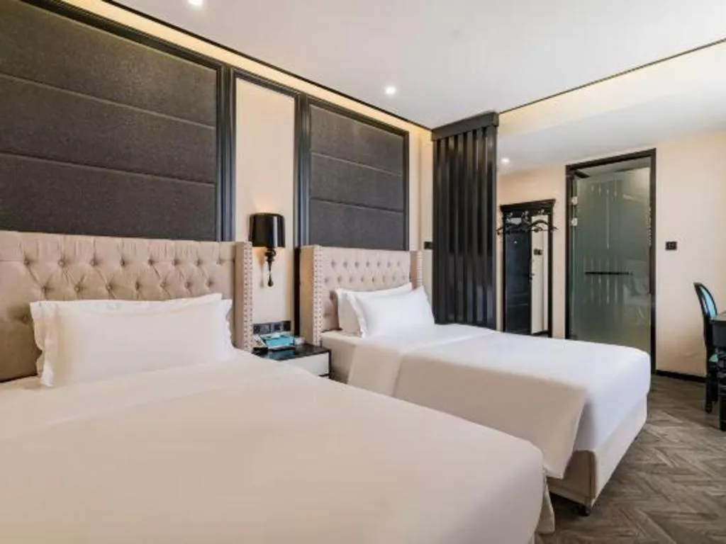 Bed in Xana Lite Hotelle Tianjin Huaming Binhai International Airport