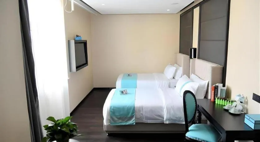 Bed in Xana Lite Hotelle Tianjin Huaming Binhai International Airport