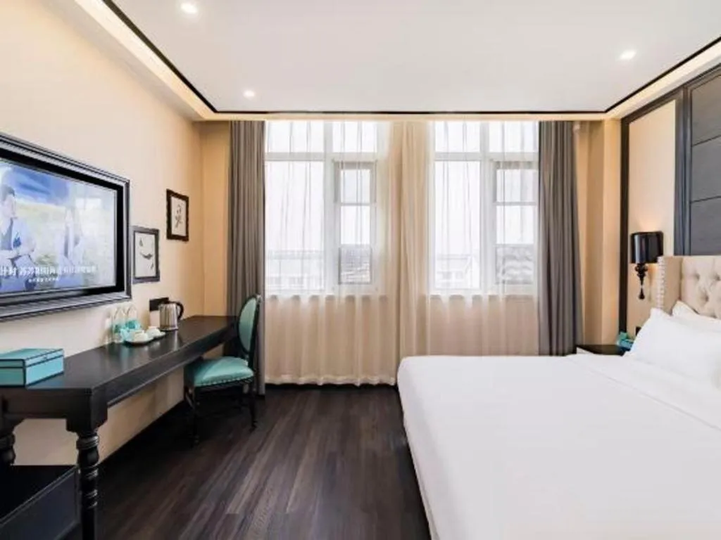 Bed in Xana Lite Hotelle Tianjin Huaming Binhai International Airport