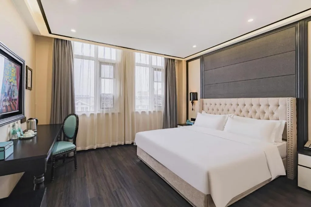 Bed in Xana Lite Hotelle Tianjin Huaming Binhai International Airport