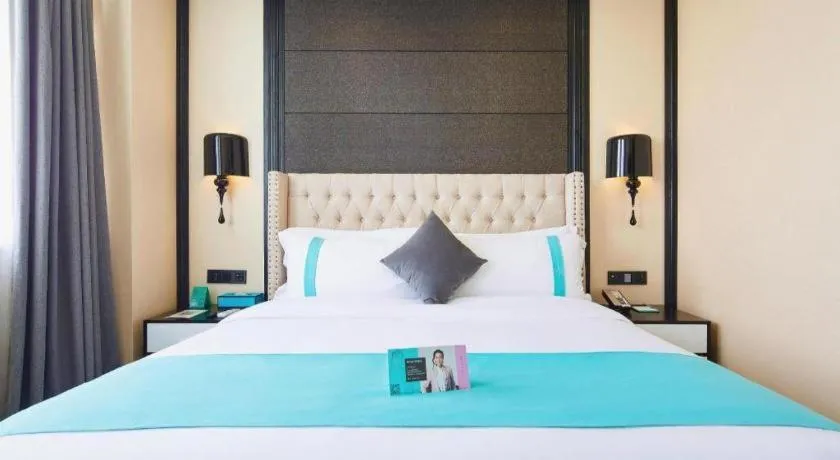 Bed in Xana Lite Hotelle Tianjin Huaming Binhai International Airport