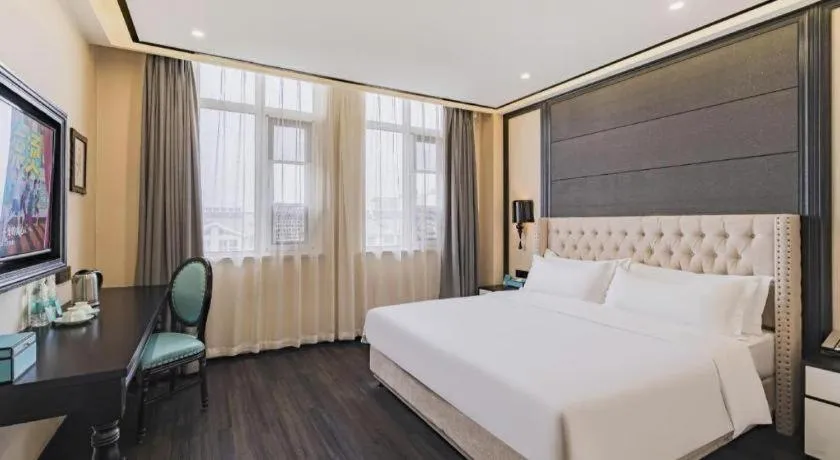 Bed in Xana Lite Hotelle Tianjin Huaming Binhai International Airport