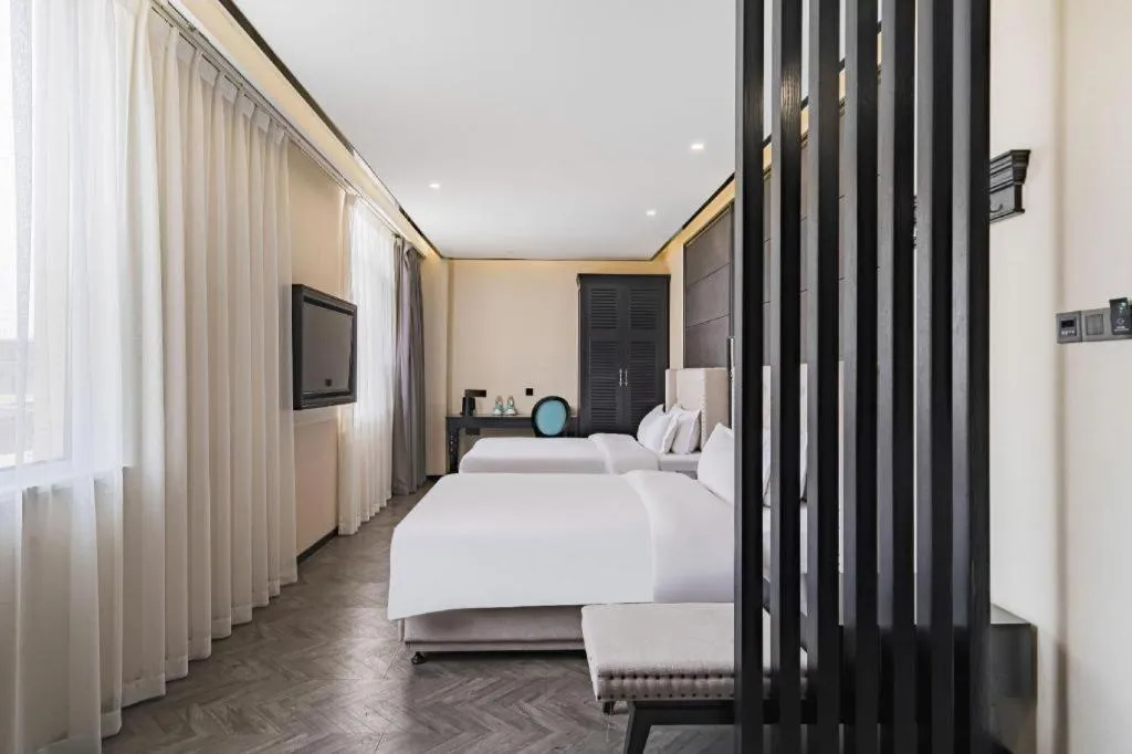 Bed in Xana Lite Hotelle Tianjin Huaming Binhai International Airport