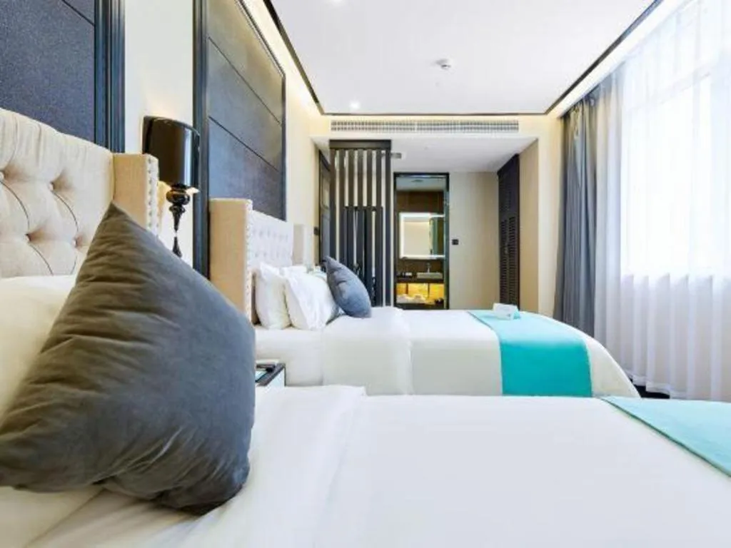 Bed in Xana Lite Hotelle Tianjin Huaming Binhai International Airport