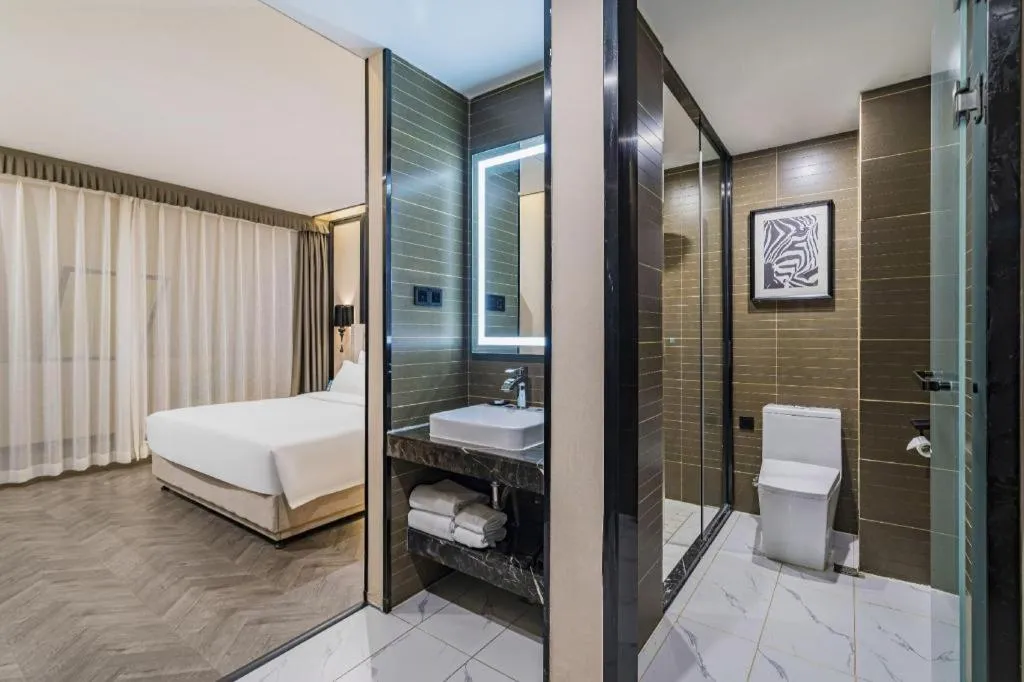 Bed in Xana Lite Hotelle Tianjin Huaming Binhai International Airport