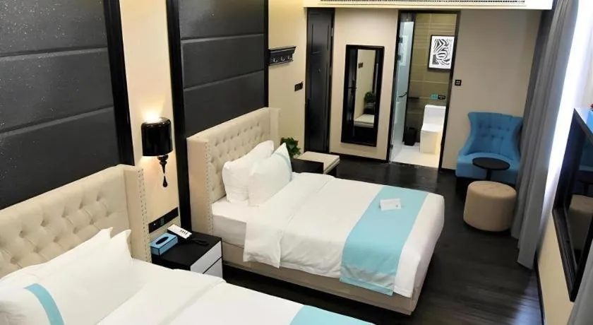 Bed in Xana Lite Hotelle Tianjin Huaming Binhai International Airport