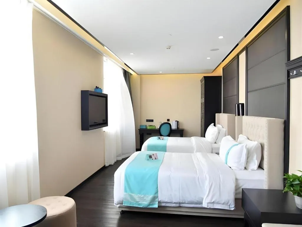 Bed in Xana Lite Hotelle Tianjin Huaming Binhai International Airport