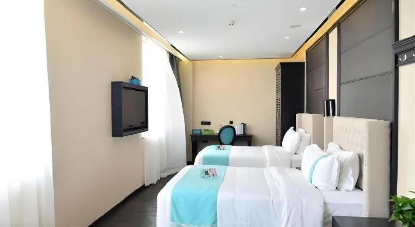 Bed in Xana Lite Hotelle Tianjin Huaming Binhai International Airport