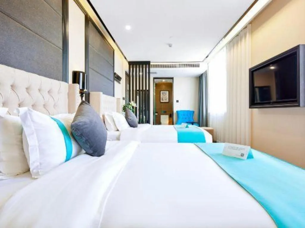 Bed in Xana Lite Hotelle Tianjin Huaming Binhai International Airport