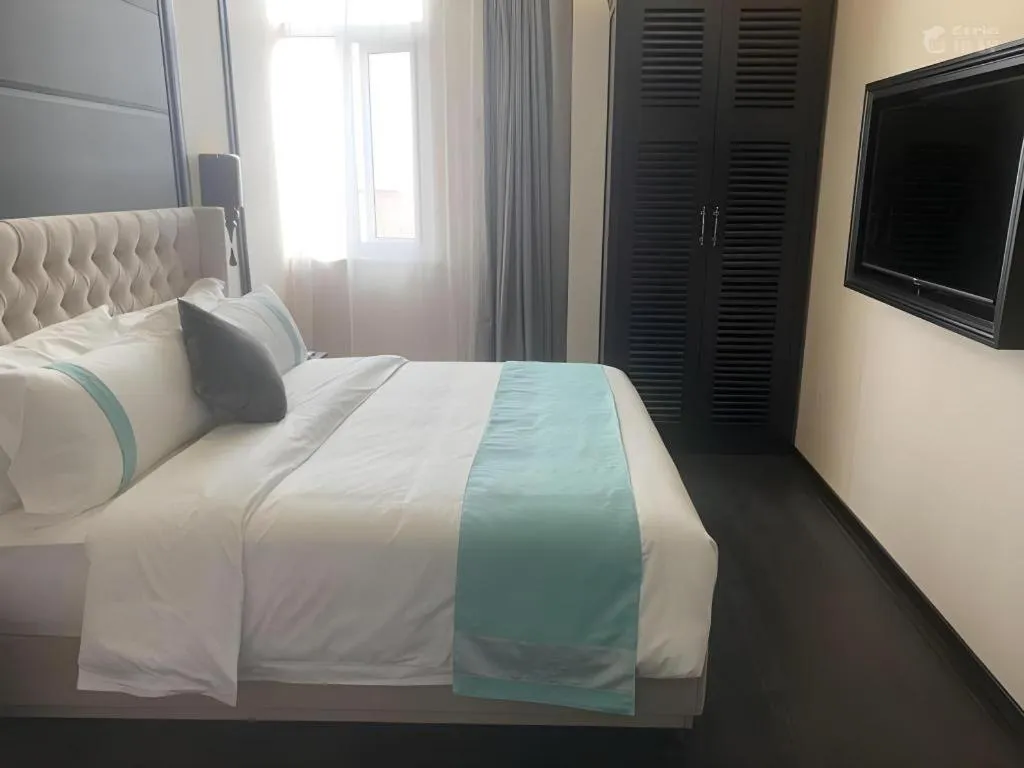 Bed in Xana Lite Hotelle Tianjin Huaming Binhai International Airport