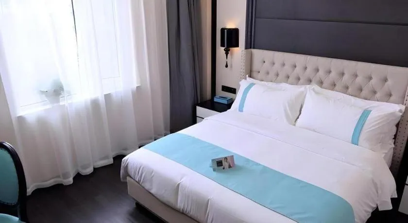 Bed in Xana Lite Hotelle Tianjin Huaming Binhai International Airport