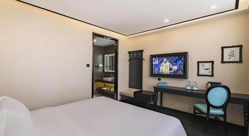 Bed in Xana Lite Hotelle Tianjin Huaming Binhai International Airport