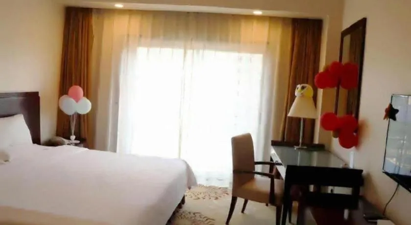 Bed in Jinjiang Hotel Qianan