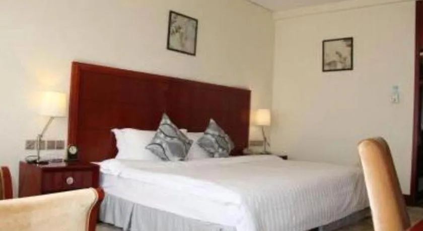 Bed in Jinjiang Hotel Qianan