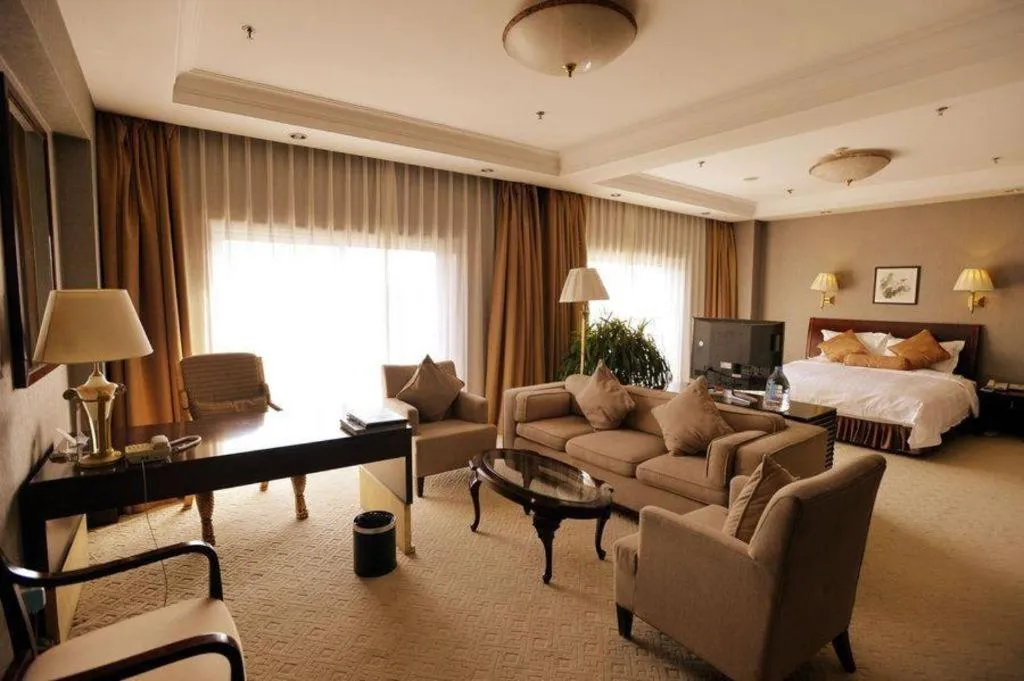 Bed in Jinjiang Hotel Qianan