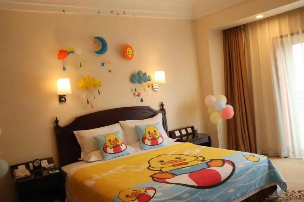 Bed in Jinjiang Hotel Qianan