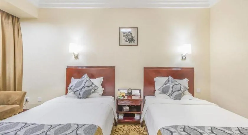 Bed in Jinjiang Hotel Qianan