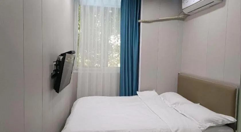 Bed in Shell Hotel Taixing Huangqiao Town Dinghui Road