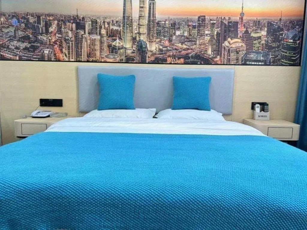 Bed in Shell Hotel Taixing Huangqiao Town Dinghui Road