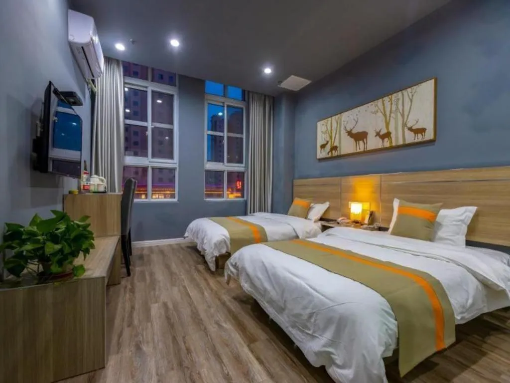 Bed in Shell Hotel Taixing Huangqiao Town Dinghui Road