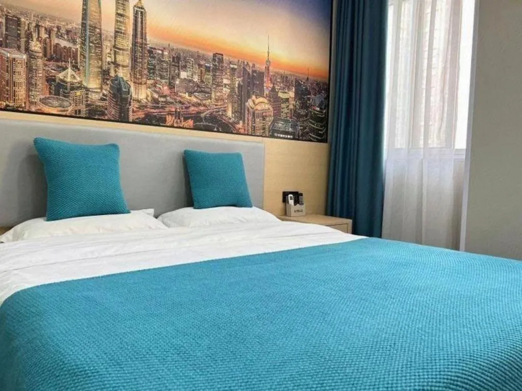 Bed in Shell Hotel Taixing Huangqiao Town Dinghui Road