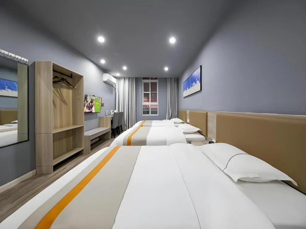 Bed in Shell Hotel Taixing Huangqiao Town Dinghui Road