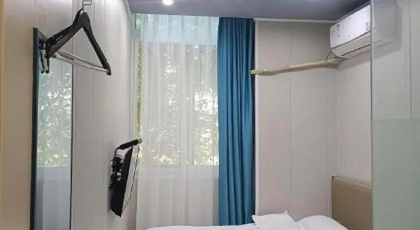 Bed in Shell Hotel Taixing Huangqiao Town Dinghui Road