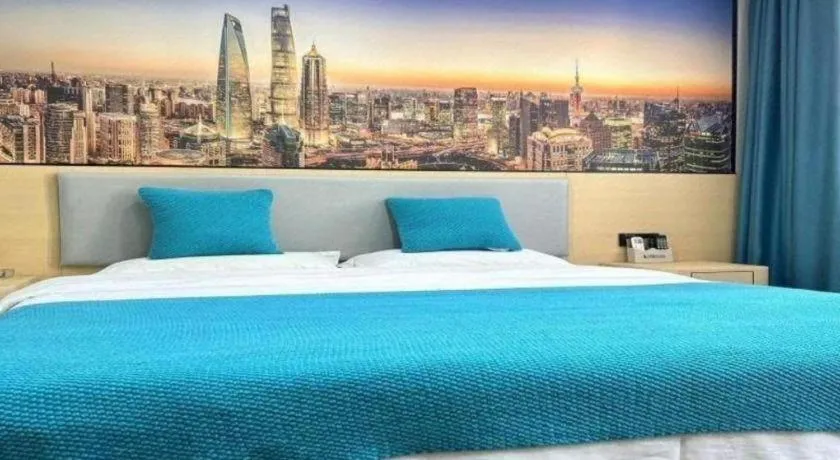 Bed in Shell Hotel Taixing Huangqiao Town Dinghui Road