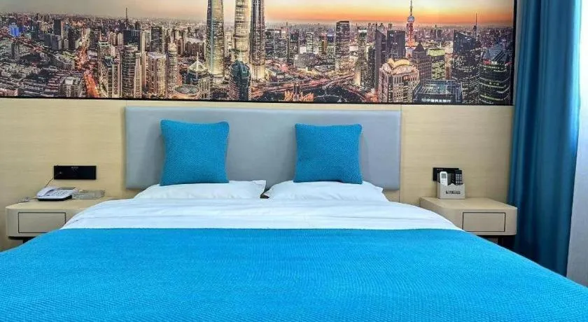 Bed in Shell Hotel Taixing Huangqiao Town Dinghui Road