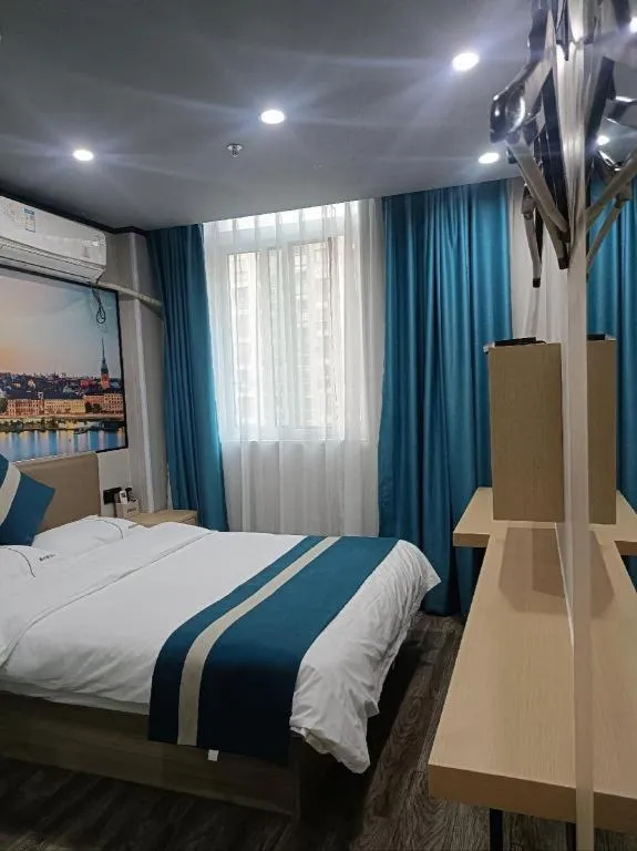 Bed in Shell Hotel Taixing Huangqiao Town Dinghui Road