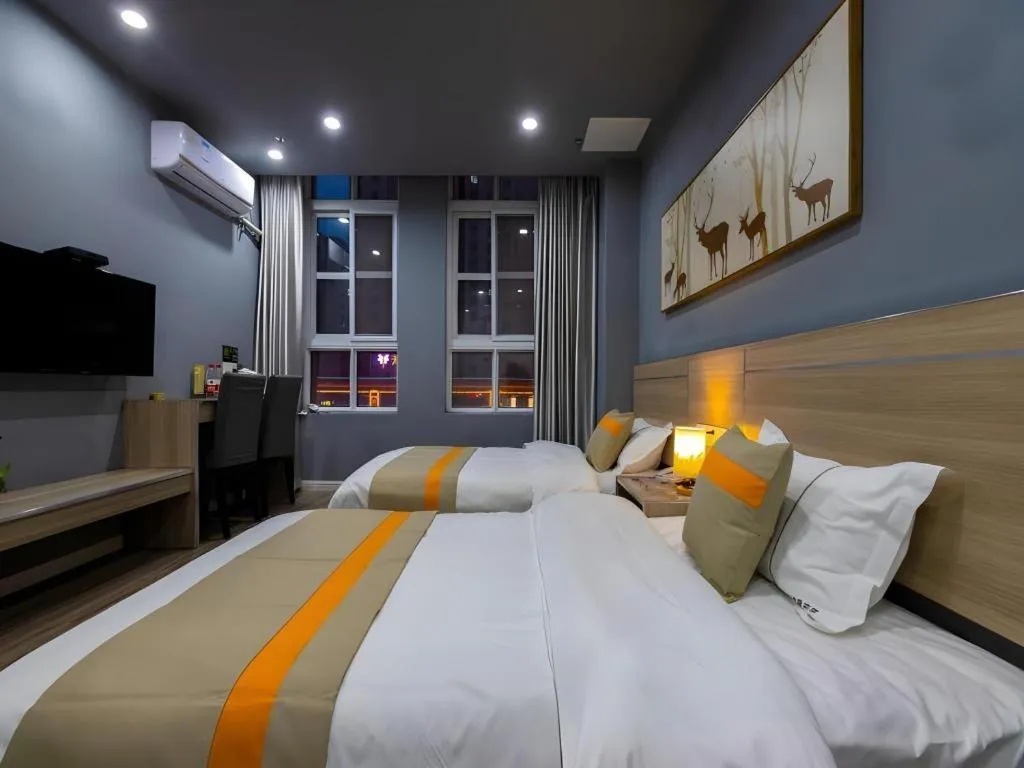 Bed in Shell Hotel Taixing Huangqiao Town Dinghui Road