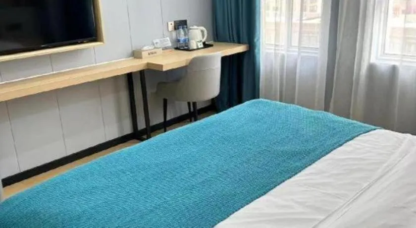 Bed in Shell Hotel Taixing Huangqiao Town Dinghui Road