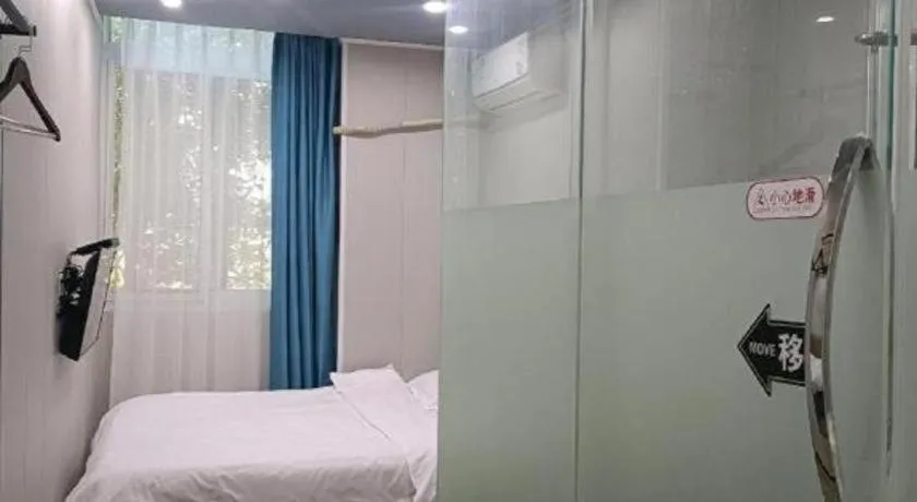 Bed in Shell Hotel Taixing Huangqiao Town Dinghui Road