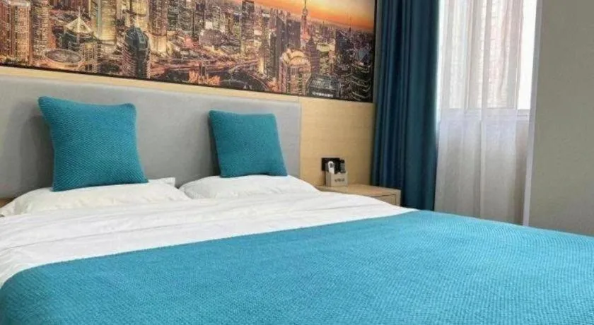Bed in Shell Hotel Taixing Huangqiao Town Dinghui Road