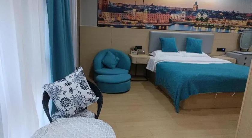 Bed in Shell Hotel Taixing Huangqiao Town Dinghui Road