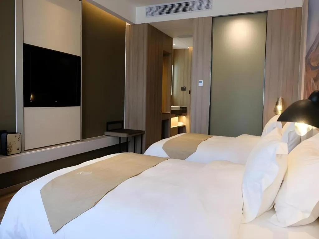 Bed in GreenTree Eastern Hotel Bengbu Huaishang District Yubo Garden