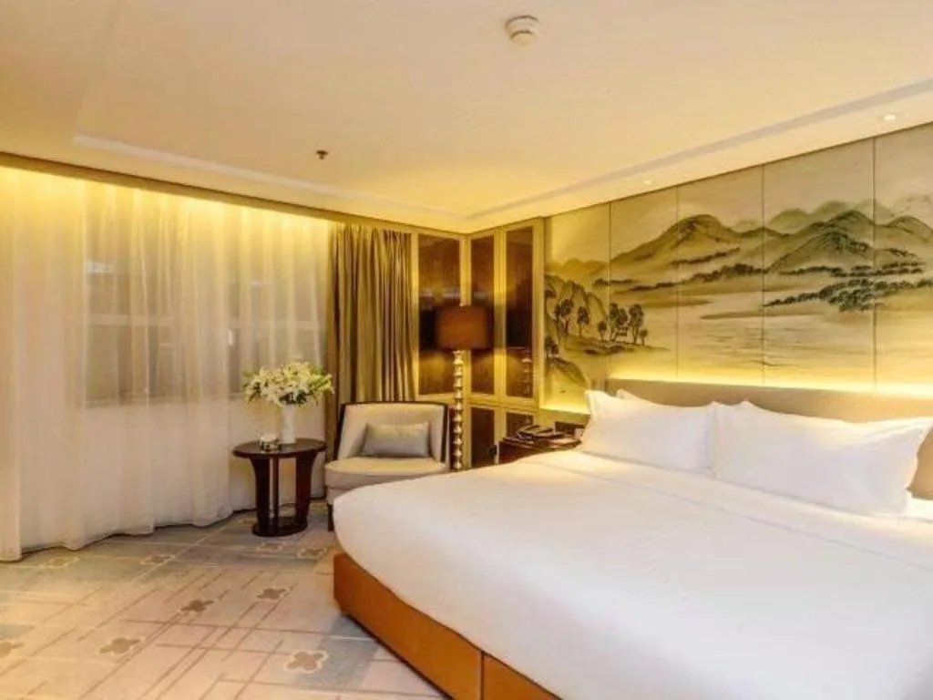 Bed in Dahe Jinjiang Hotel