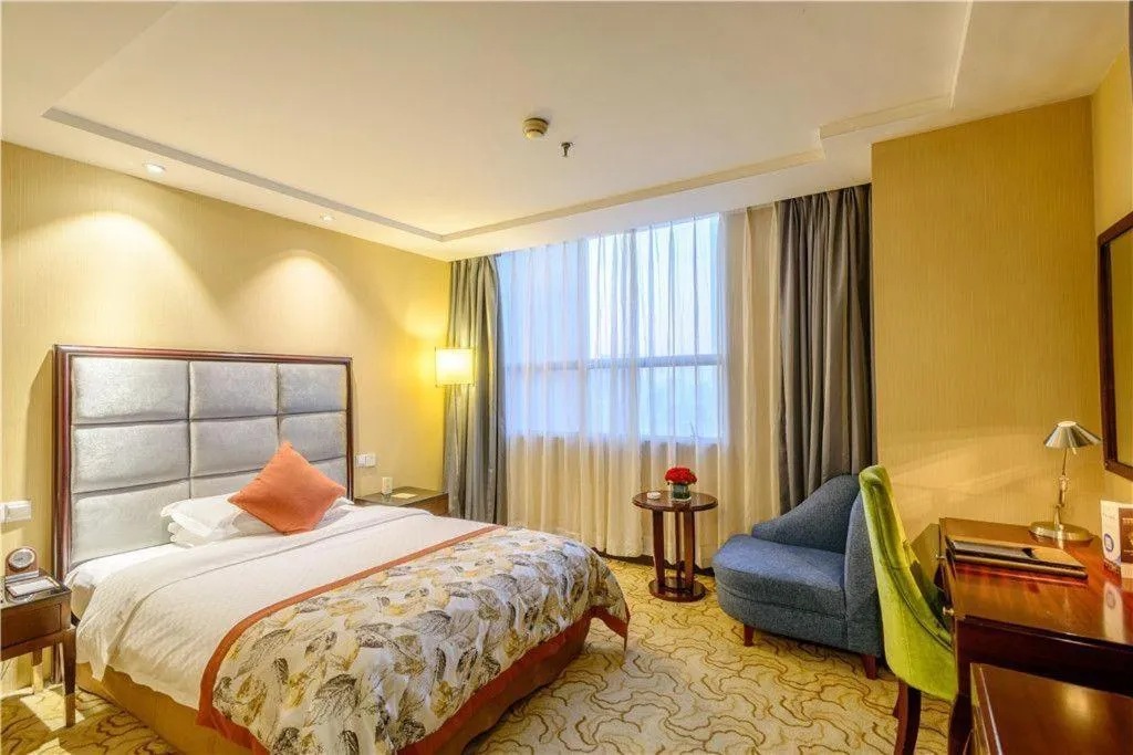 Bed in Dahe Jinjiang Hotel