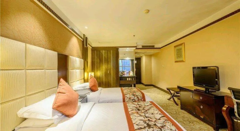 Bed in Dahe Jinjiang Hotel